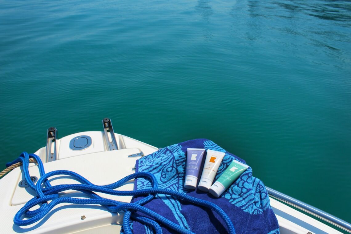 blue and white textile on white boat
